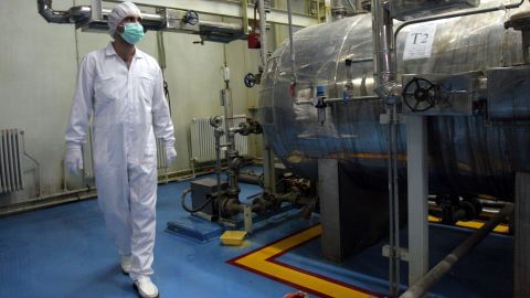 (File) A technician walks through the Uranium Conversion Facility outside the city of Isfahan, Iran, in February 3, 2007. 
