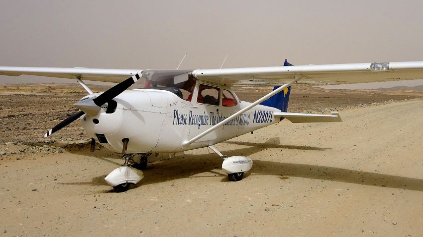 TO GO WITH AFP STORY BY SIMON MARTELLI The aircraft of Kosovar pilot James Barisha sits in the desert after he was forced to crash-land in the desert between Port Sudan and Khartoum on June 4, 2011. When he took off in his Cessna 172 from Texas two years ago, James Berisha vowed to visit every nation on earth to raise awareness of his beloved homeland, Kosovo, proclaimed independent a year earlier. His dream came close to ending in tragedy, when an engine cylinder blew at 8,500 feet, forcing him to crash-land in the Sudanese desert when he was just two countries short of conquering the African continent. AFP PHOTO/STR (Photo credit should read -/AFP/Getty Images)