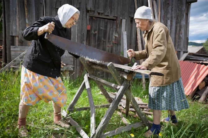 Sisters Aleftina and Ludmila Sablina are in their 70s, they continue to carry on with their traditional way of life in Alekhovshchina, a small Russian village. While most neighbors have upgraded to chainsaws, they continue to use a two-handed saw to cut wood which has been in the family for decades.   
