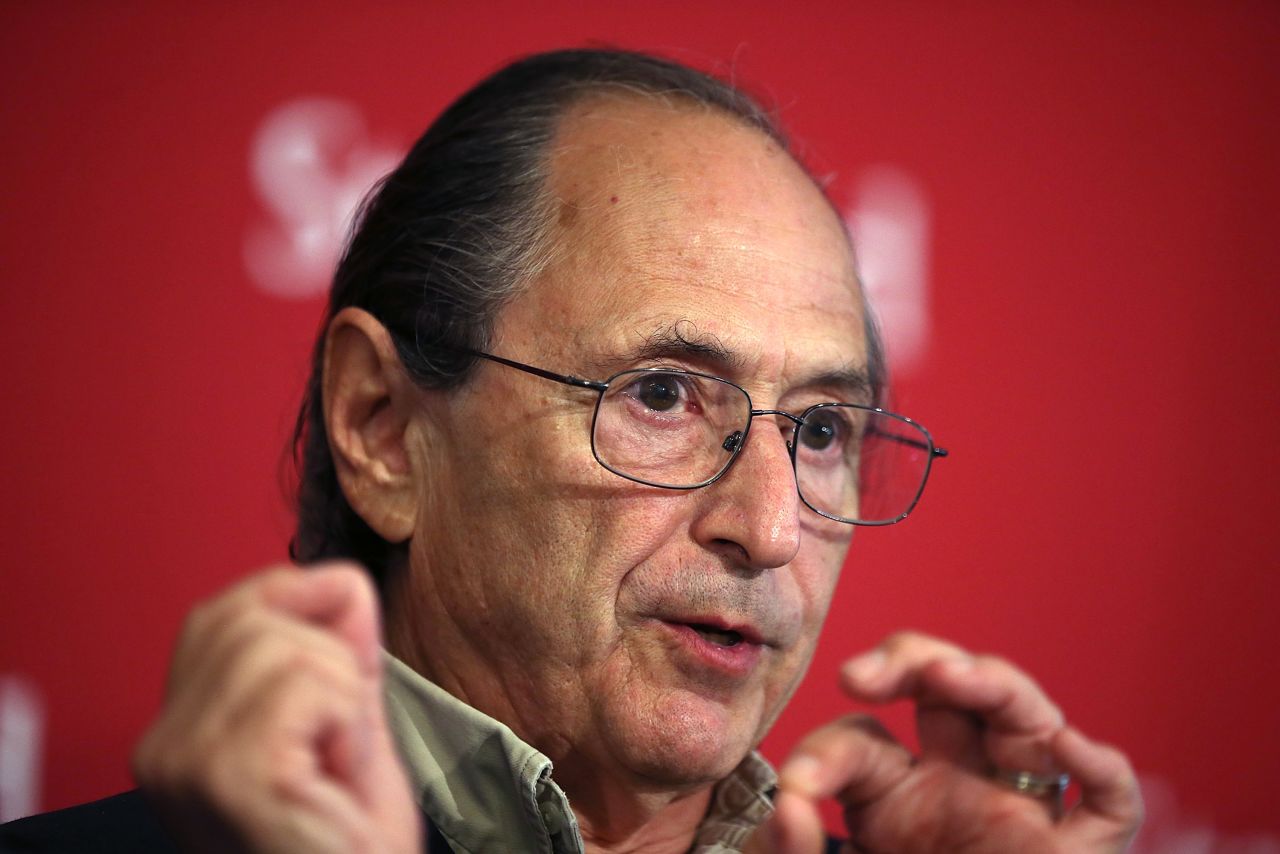 Biophysicist Michael Levitt at a news conference after winning the Nobel Prize in chemistry on October 9 at Stanford University in Stanford, California. The computer programs the men created eliminate the need for some lab testing. One example would be helping to reduce the necessity of testing a new drug on animals,