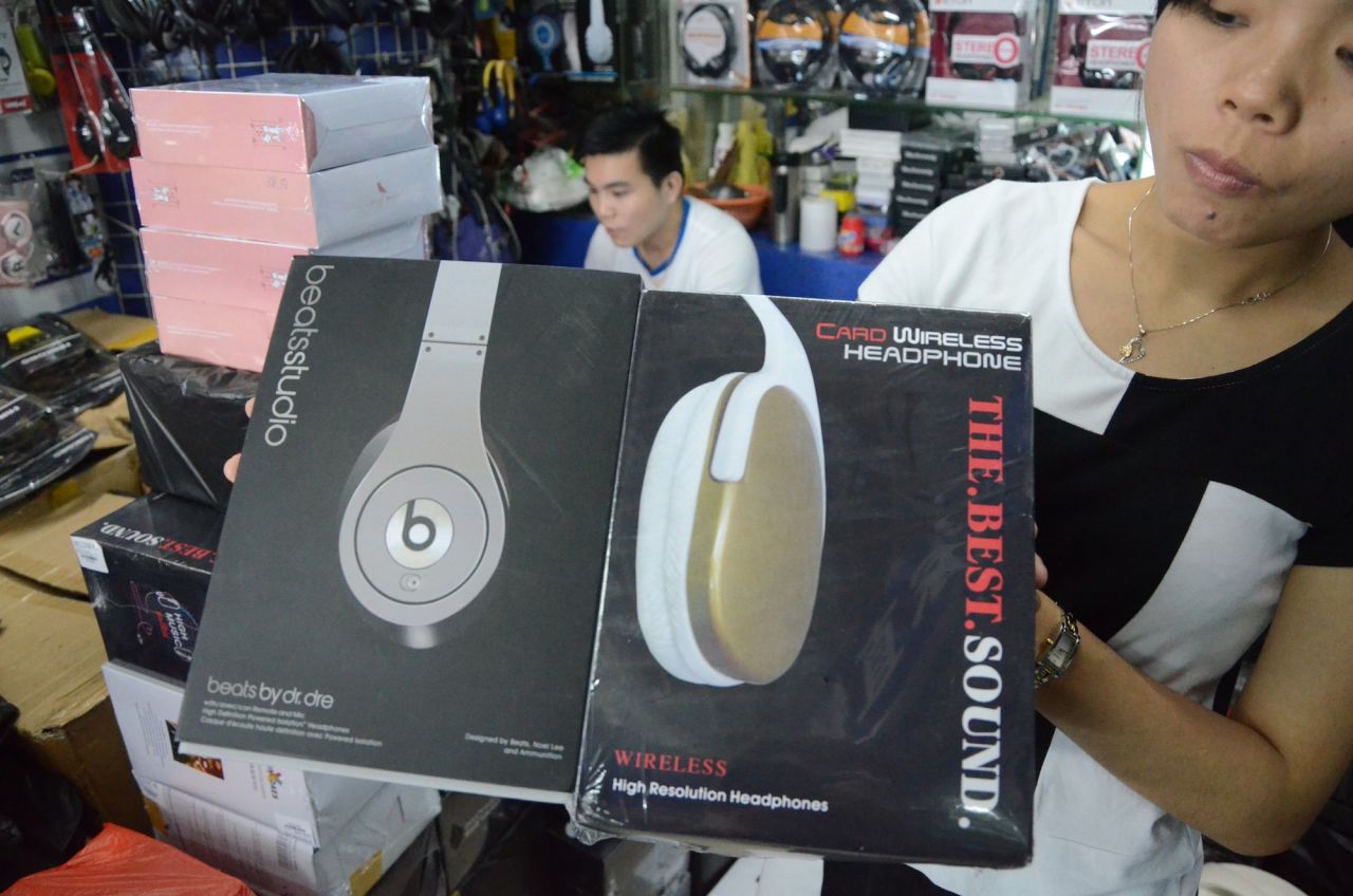 In an attempt to trick customs officials, counterfeiters send fake Beats in two boxes; the outer box, on the right,  has a made-up name to hide the real goods.