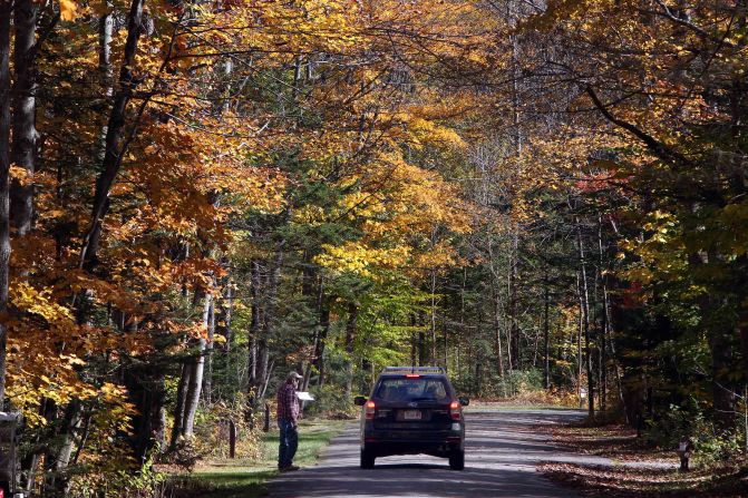 A camping party at the Dolly Copp campground in Gorham, New Hampshire, on October 9 is told that the park will close on Thursday, October 10, at noon. The privately run campground in New Hampshire's White Mountains National Forest was forced to close ahead of the lucrative Columbus Day weekend because of the federal government shutdown.