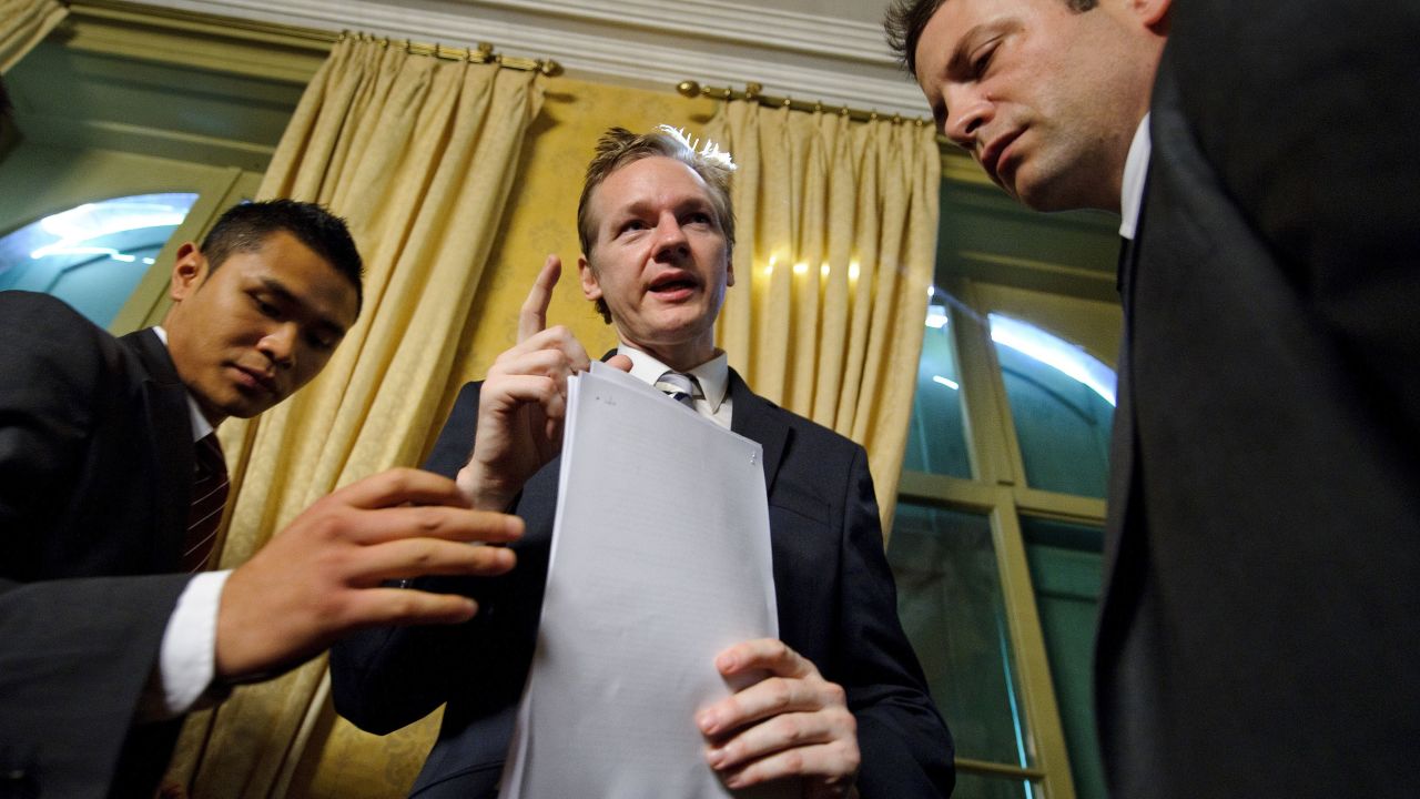 Assange and his bodyguards are seen after a news conference in Geneva, Switzerland, in November 2010. It was the month WikiLeaks began releasing diplomatic cables from US embassies.