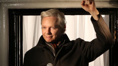 Assange speaks from a window of the Ecuadorian Embassy in London on December 20, 2012.