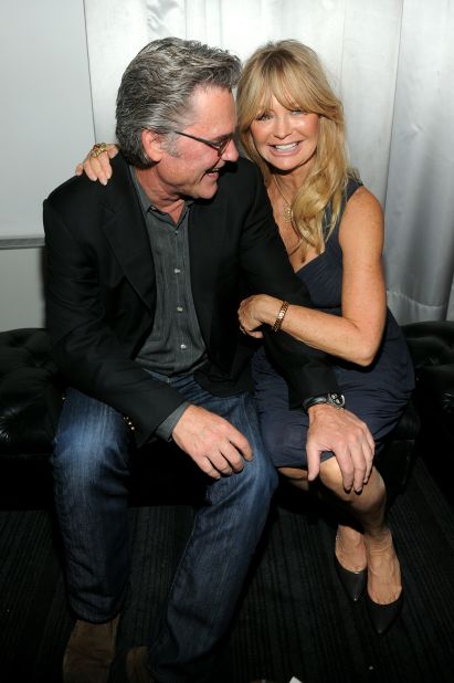 Actor Kurt Russell, 67, and partner Goldie Hawn, 72, are championed as one of the happiest unmarried couples around. Whenever we see them, they're always beaming. Onlookers at a New York movie premiere in September 2014 <a href="http://www.express.co.uk/news/showbiz/432333/Goldie-Hawn-and-Kurt-Russell-prove-they-re-more-in-love-than-ever-at-charity-event" target="_blank" target="_blank">commented that the two could hardly keep their hands off one another. </a>