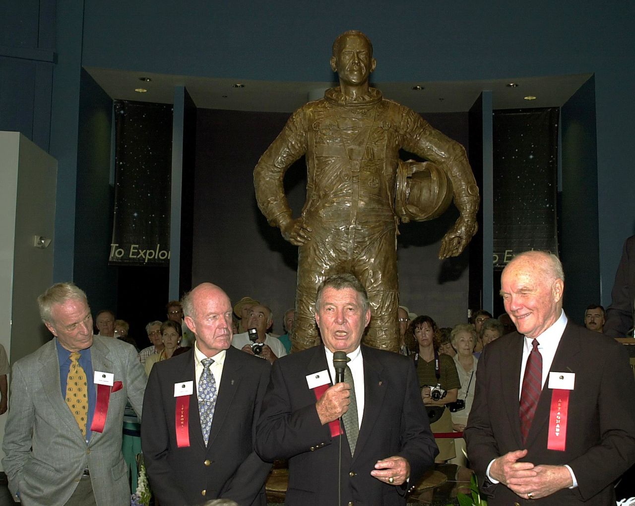 Four Mercury Seven astronauts -- Carpenter, left, Gordon Cooper, Walter Schirra and John Glenn -- talk about the early years of the manned space program at the unveiling of a statue of America's first man in space, Alan B. Shepard Jr., on March 20, 2000, at the Astronaut Hall of Fame in Titusville, Florida. 