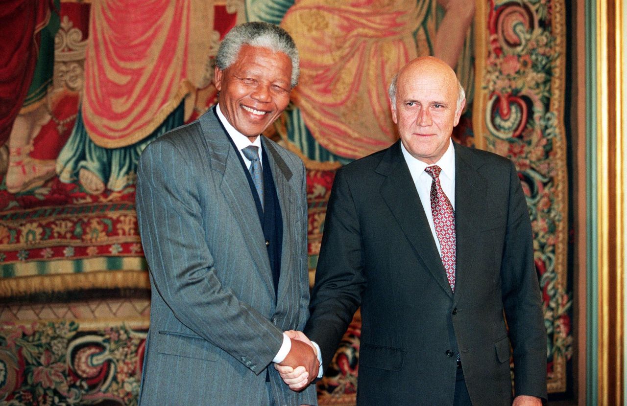 South African National Congress President Nelson Mandela, left, and South African President F.W. de Klerk shake hands in Oslo, Norway, on December 10, 1993, after being awarded the Nobel Peace Prize. 