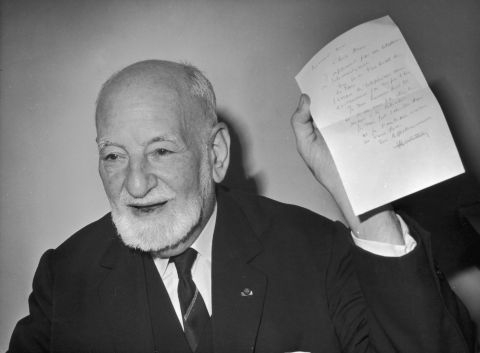 Rene Cassin, the French jurist and a deputy chairman of the NATO committee for human rights, holds up a telegram after being notified of winning the Nobel Peace Prize in 1968. 