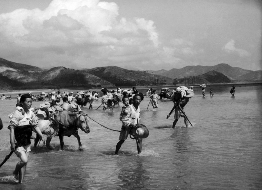 North Korean refugees cross the Naktong River in South Korea on August 6, 1950, just a short time before the beginning of the conflict between North and South Korea. The U.N. forces in Korea had set a time limit of 15 hours for crossing the river. In 1954, the Nobel Peace Prize was awarded to the UNHCR, the Office of the United Nations High Commissioner for Refugees. 