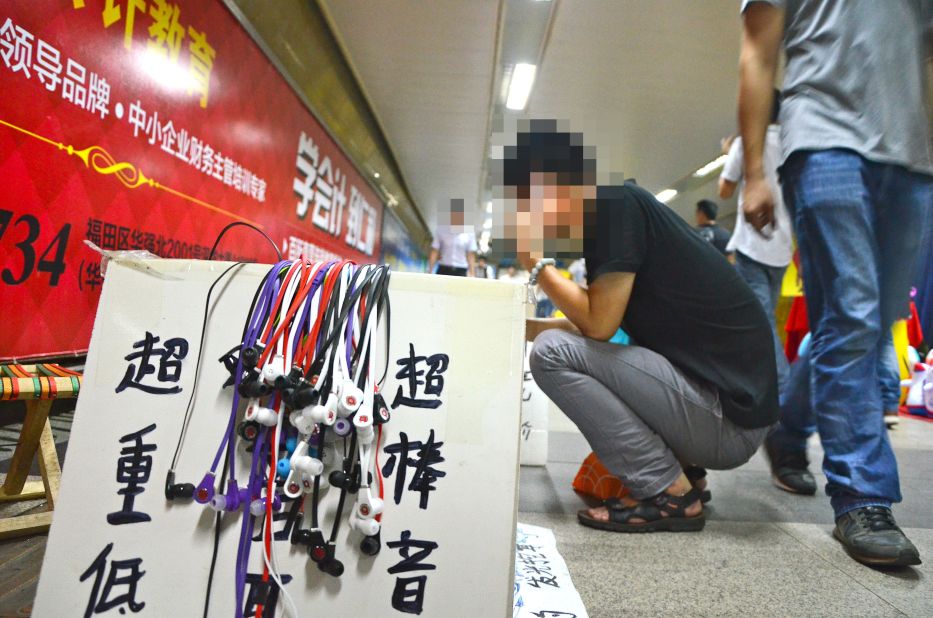 On the streets and down in the Shenzhen subway, in-ear fake Beats headphones are sold for as little as $1. 