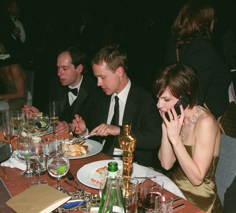 Actress Hilary Swank uses a flip phone in 2000.