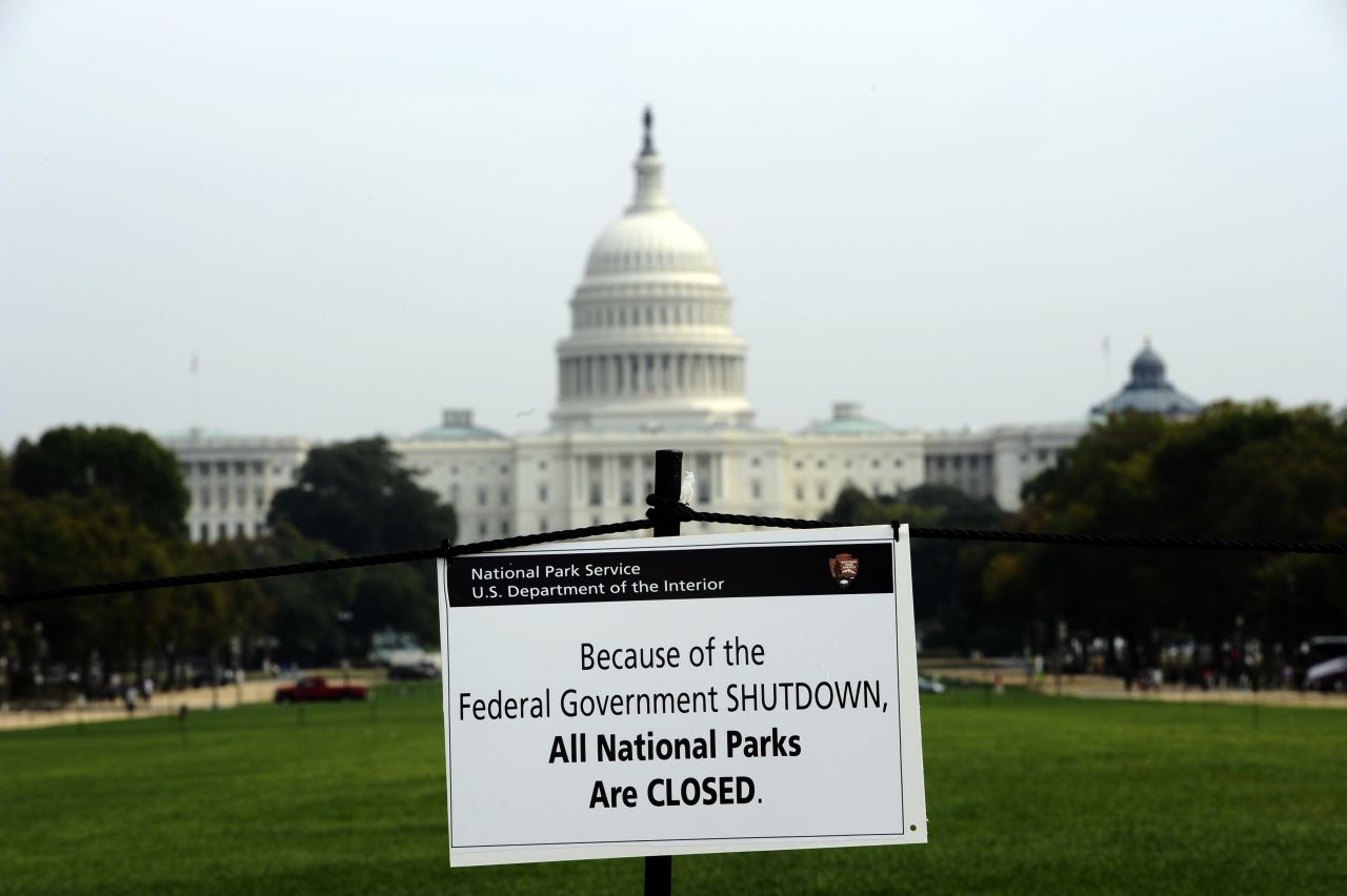 A closure sign is posted on the National Mall near the U.S. Capitol. Much of Washington remains closed with hundreds of thousands of government workers furloughed. 