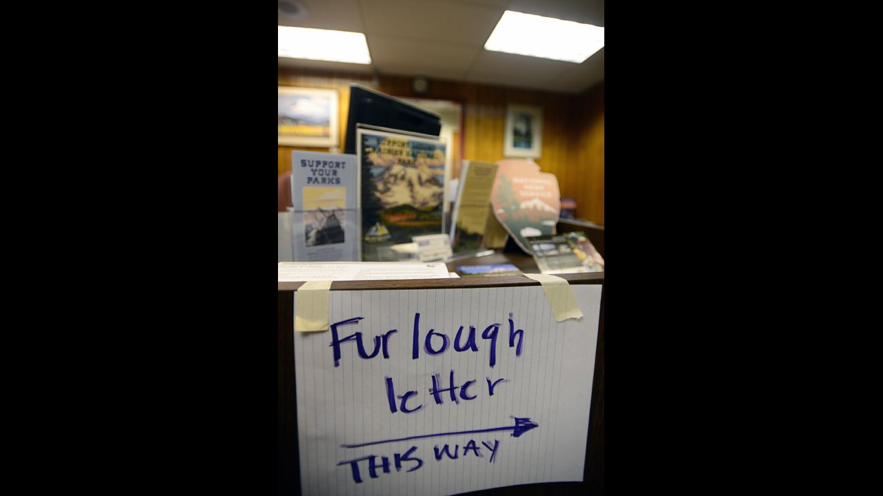 A handwritten sign at the Mount Rainier National Park administration building tells employees where to pick up their furlough letters October 1.