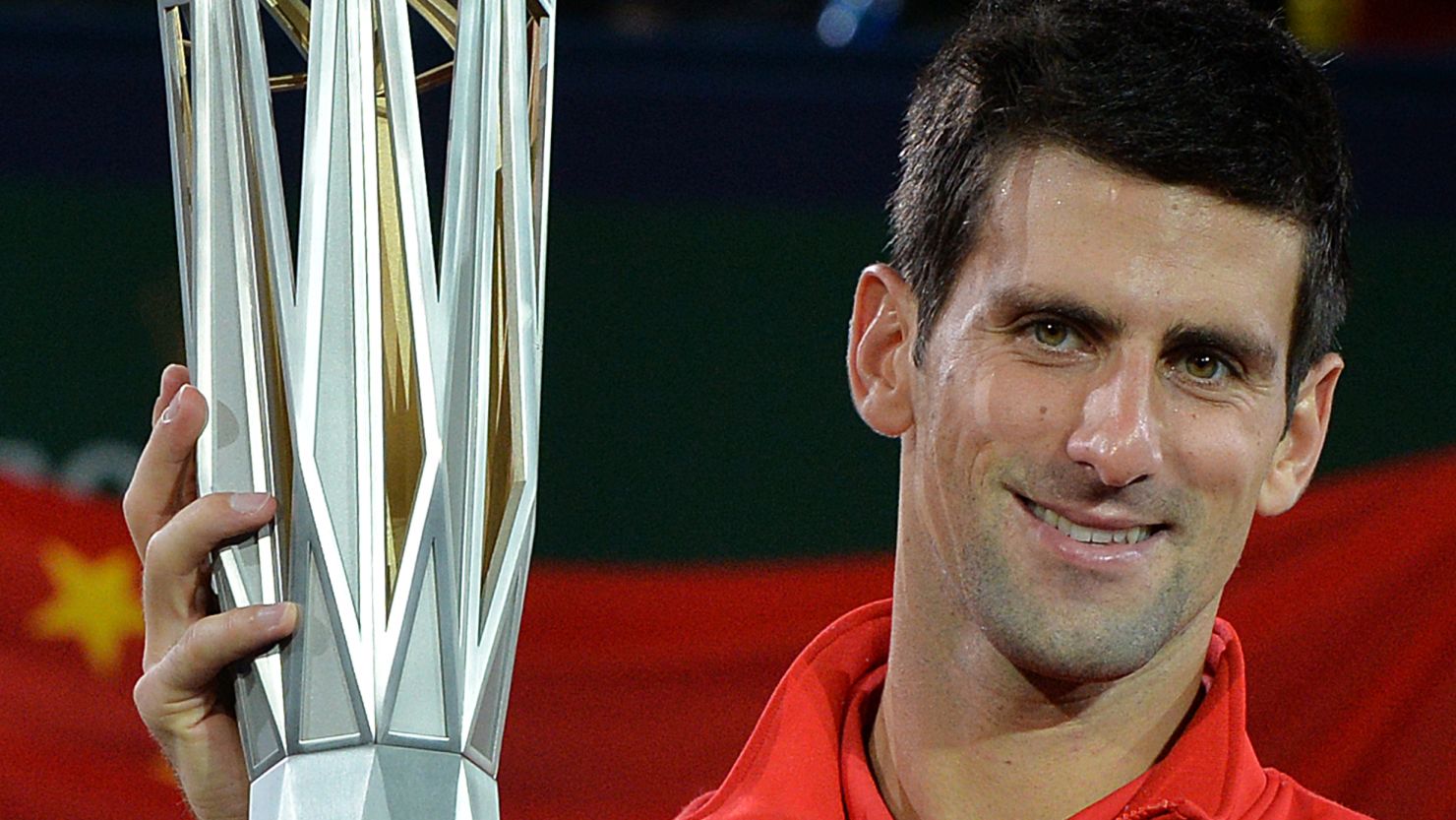 Novak Djokovic gets his hands on the Shanghai Masters trophy again after seeing off Juan Martin Del Potro in the final.