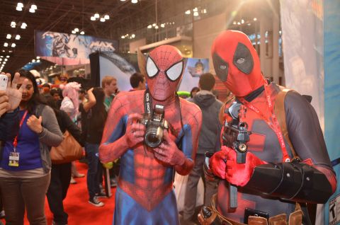 Popular Marvel Comics characters <a href="http://ireport.cnn.com/docs/DOC-1047487">Spider-Man and Deadpool</a> pose with their accessories of choice.