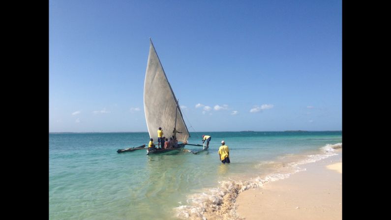 Tour guide Scott Isom says he was excited to go to Zanzibar because it shows a different side of Africa. With his tour group he explored the island and rode a wooden catamaran. He called this Indian Ocean scene "a postcard waiting to happen."
