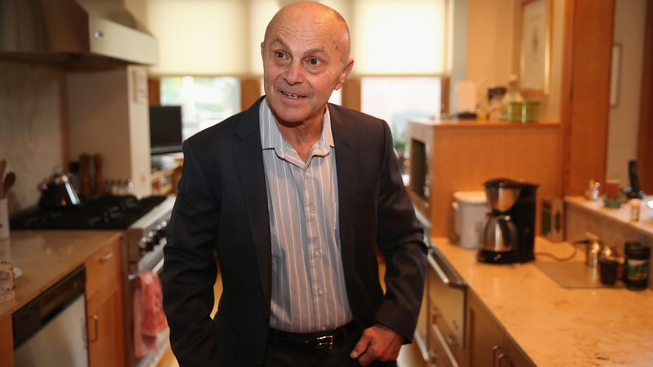 Fama prepares to leave his home to teach his morning class after learning he had won the Nobel Prize on Monday, October 14.