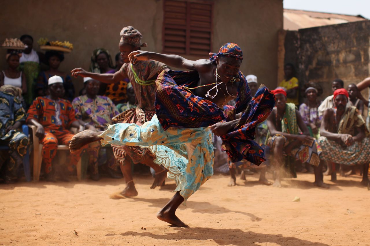 It features dancing and gin drinking, and a highlight is a horse race on the beach. Voodoo, or vodun, is recognized as a national religion in Benin.