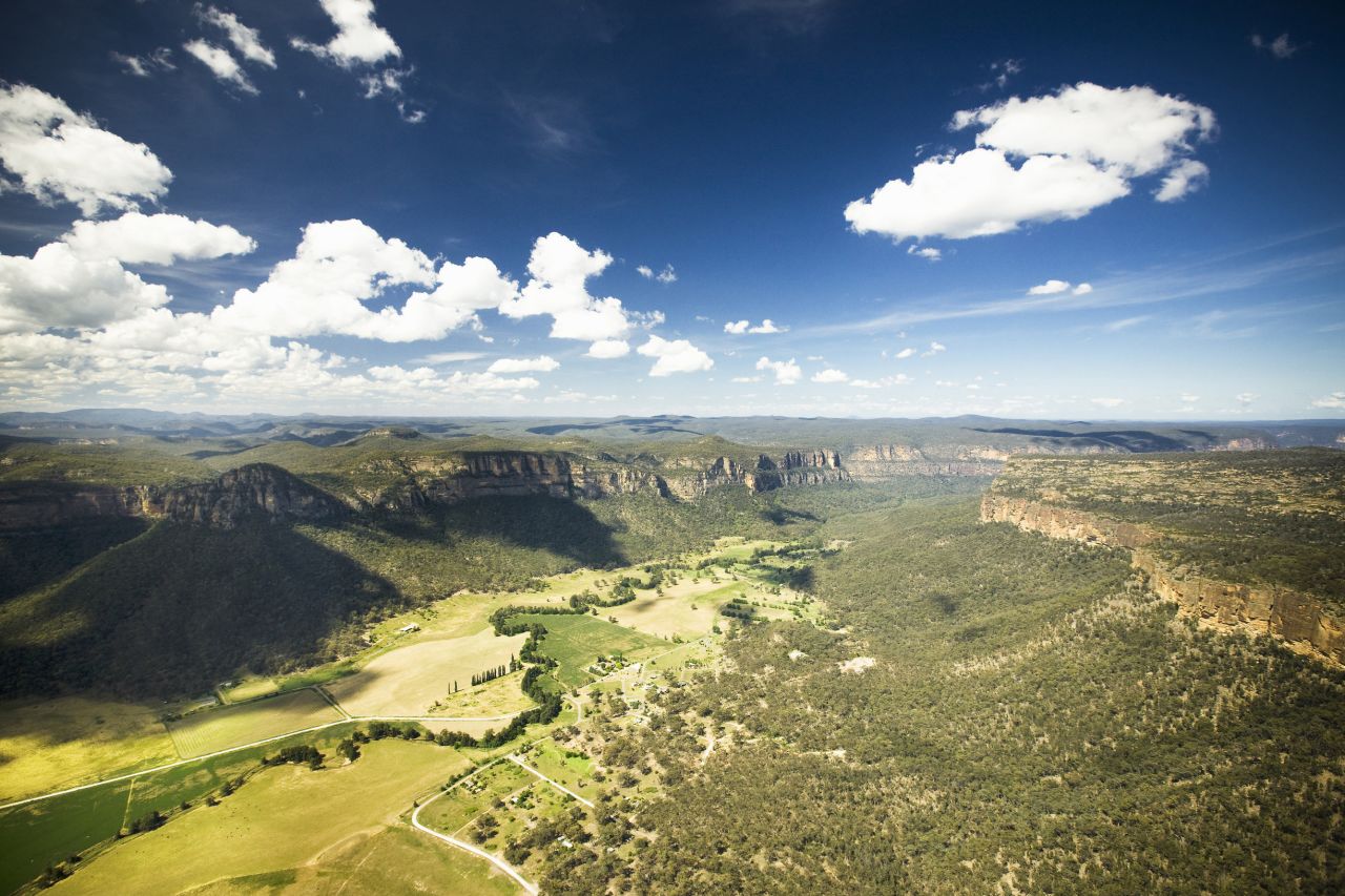 Capertee Valley, 135 kilometers northwest of Sydney, is said to be slightly longer than the Grand Canyon but not quite as deep, making it the world's second-largest enclosed canyon.