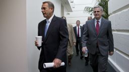Speaker of the House John Boehner, R-Ohio, with House Majority Whip Kevin McCarthy, R-Calif., right, walks to a meeting of House Republicans at the Capitol in Washington, Tuesday, Oct. 15, 2013, as a partial government shutdown enters its third week. It is not yet clear how Boehner and tea party members in the House majority will respond to the Senate's Democratic and Republican leaders closing in on a deal to avoid an economy-menacing Treasury default and end the partial government shutdown.  (AP Photo/J. Scott Applewhite)