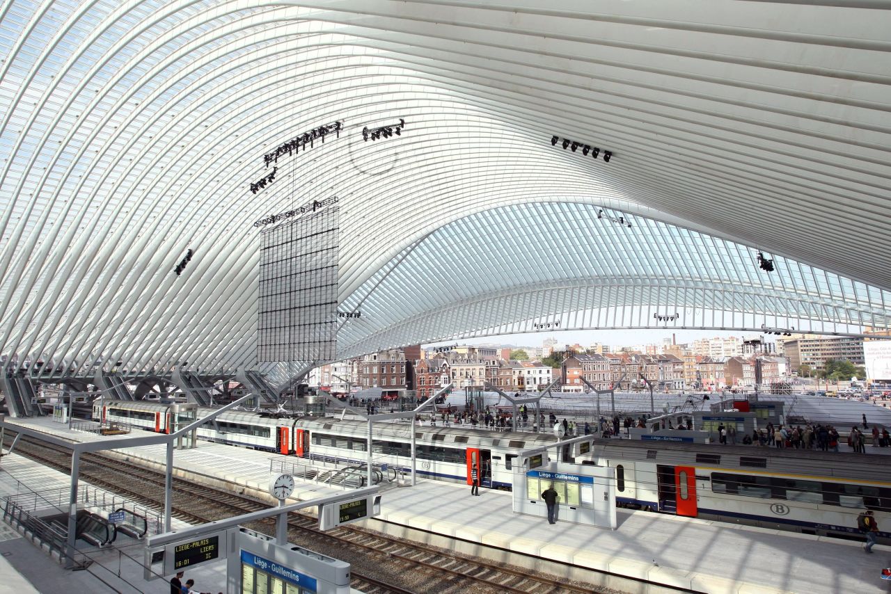 The interior of the Liège-Guillemin station in Liege, Belgium. The facility's ultra-modern glass and steel facade is featured in promotional posters for upcoming Wikileaks docu-drama, The Fifth Estate, starring Benedict Cumberbatch. Although far from Belgium's biggest or busiest station, Liège-Guillemin is fully equipped for high speed arrivals and departures as well as commuter trains.