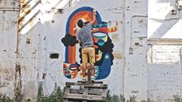 Spanish graffiti artist Ruben Sanchez has sought permission from the Dubai municipality and individual buildnig owners to create large, colorful murals.