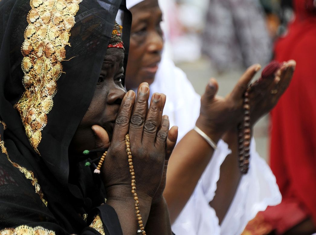 Muslims pray during Eid al-Adha, also known in the Ivory Coast as the Tabaski, on October 15 in Adjame, a popular district of Abidjan.
