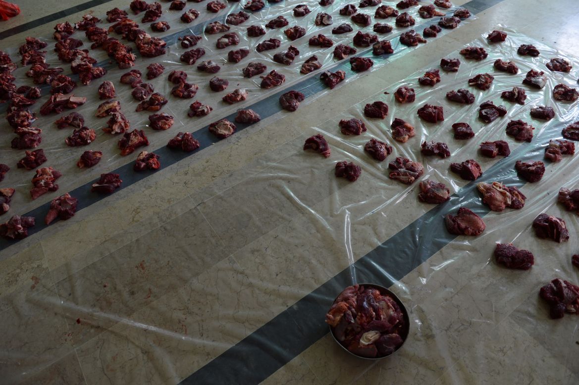 Freshly cut meat from slaughtered cattle is spread out on the floor of the Al-Falah mosque in Jakarta, Indonesia, on October 15.