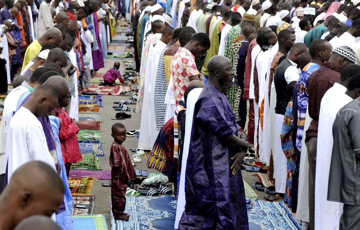 A young Muslim boy attends prayer services on October 15 in Adjame in the Ivory Coast in West Africa.