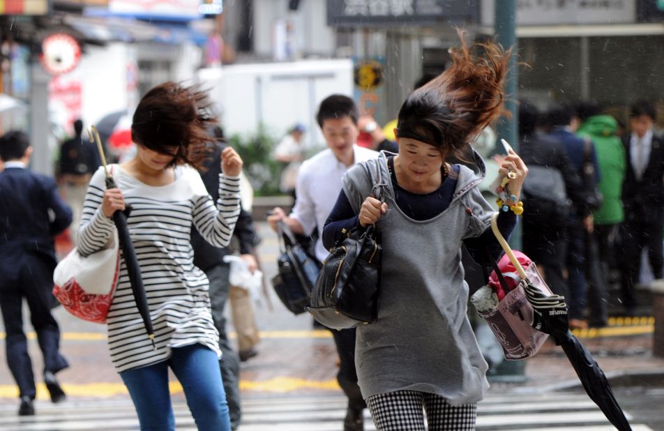 Tokyo commuters struggle to get to work.