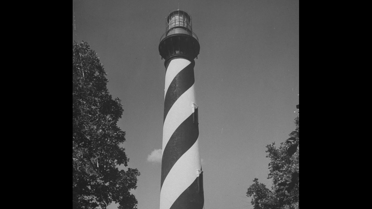 St. Augustine's lighthouse (shown here circa 1946) is the town's oldest structure, dating back to 1874. The "Dark of the Moon" tour is billed as "the only ghost tour that gets you in the tower."