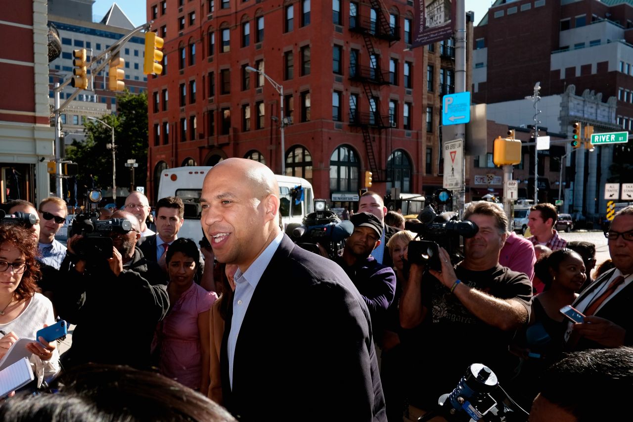 Booker greets people in Hoboken, New Jersey, after winning the Democratic primary on August 14.