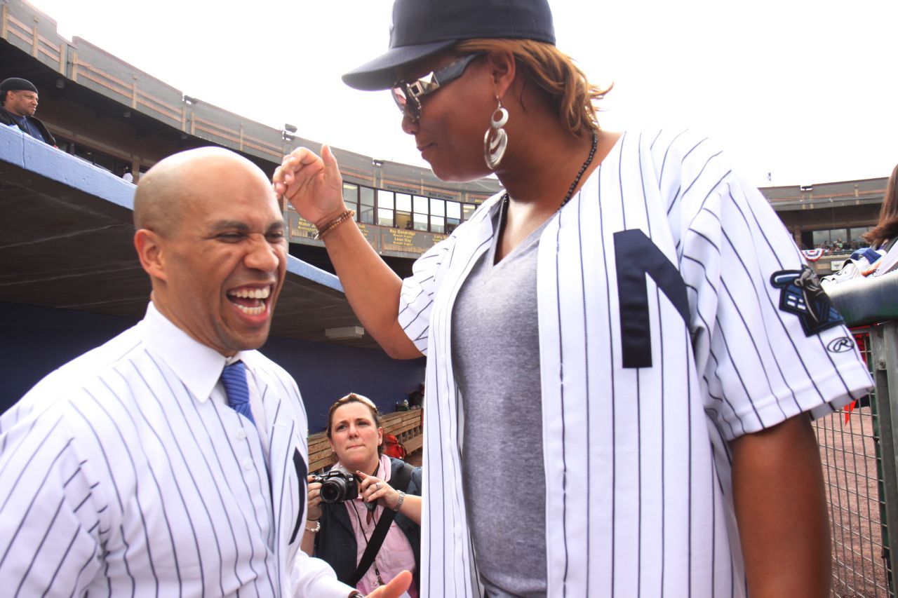Booker and musician/actress Queen Latifah attend the Atlantic League All-Star Game at Newark's Riverfront Stadium in June 2009.