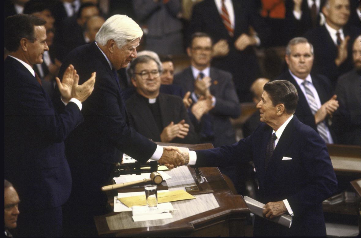 President Ronald Reagan, right, shakes hands with House Speaker Tip O'Neill during the State of the Union address in 1986. The two men had battled bitterly over Social Security reform until amendments were made to the Social Security Act in 1983.  