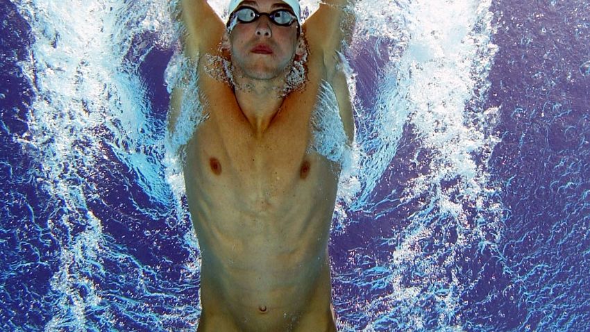 Micahel Phelps wearing a Speedo Fastskin swimming suit during the 2004 Olympics.