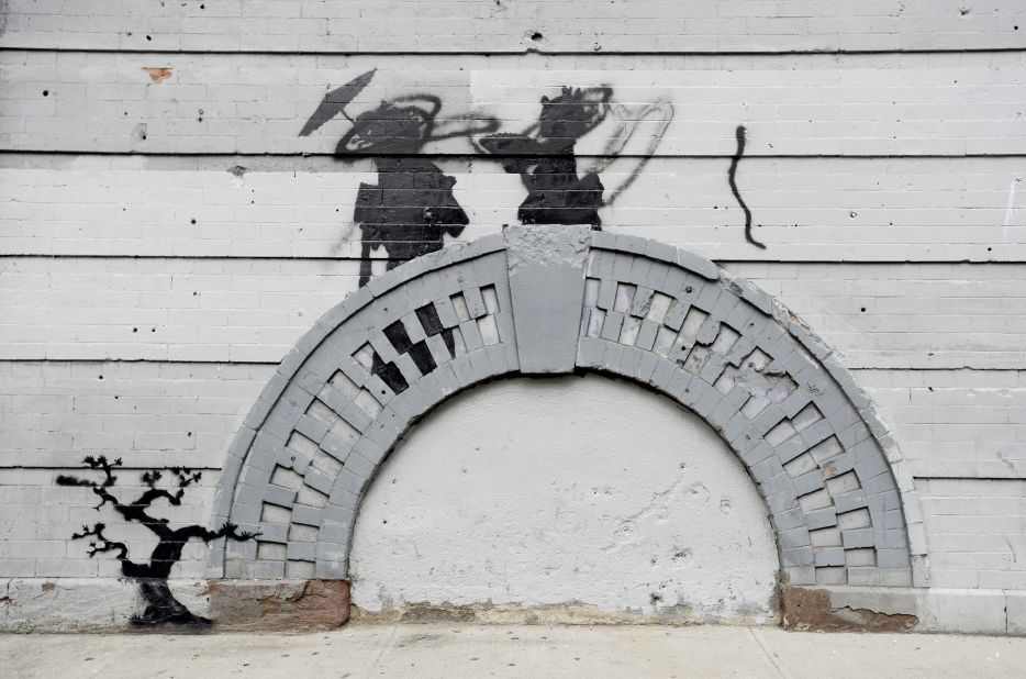 Banksy work in the Williamsburg neighborhood of Brooklyn, New York, was vandalized in broad daylight in October 2013.