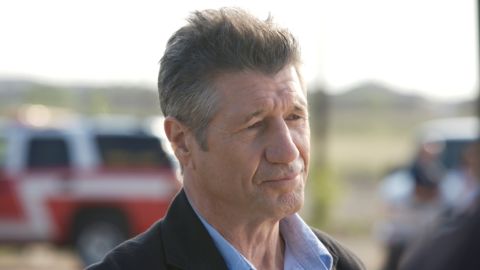 Fred Ward does grizzled pretty well. According to IMDB, he has appeared in three movies with titles containing states: "Sweet Home Alabama," "Florida Straits" and "The Prince of Pennsylvania."