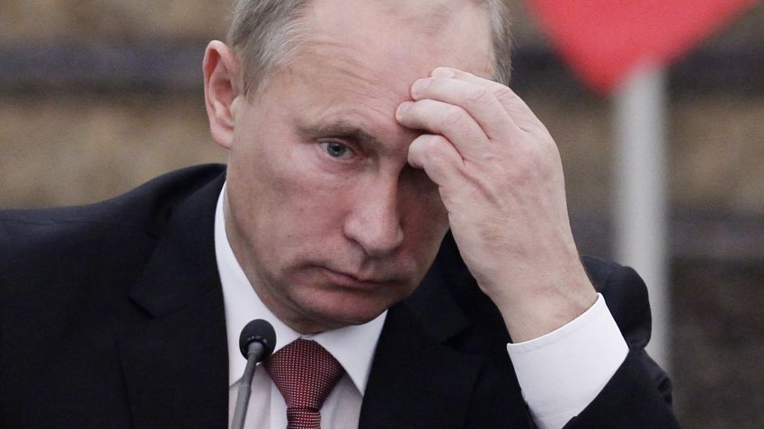 Russia Prime Minister Vladimir Putin pauses during a press conference with China's Premier Wen Jiabao (not in frame at the Great Hall of the People on October 11, 2011 in Beijing, China.