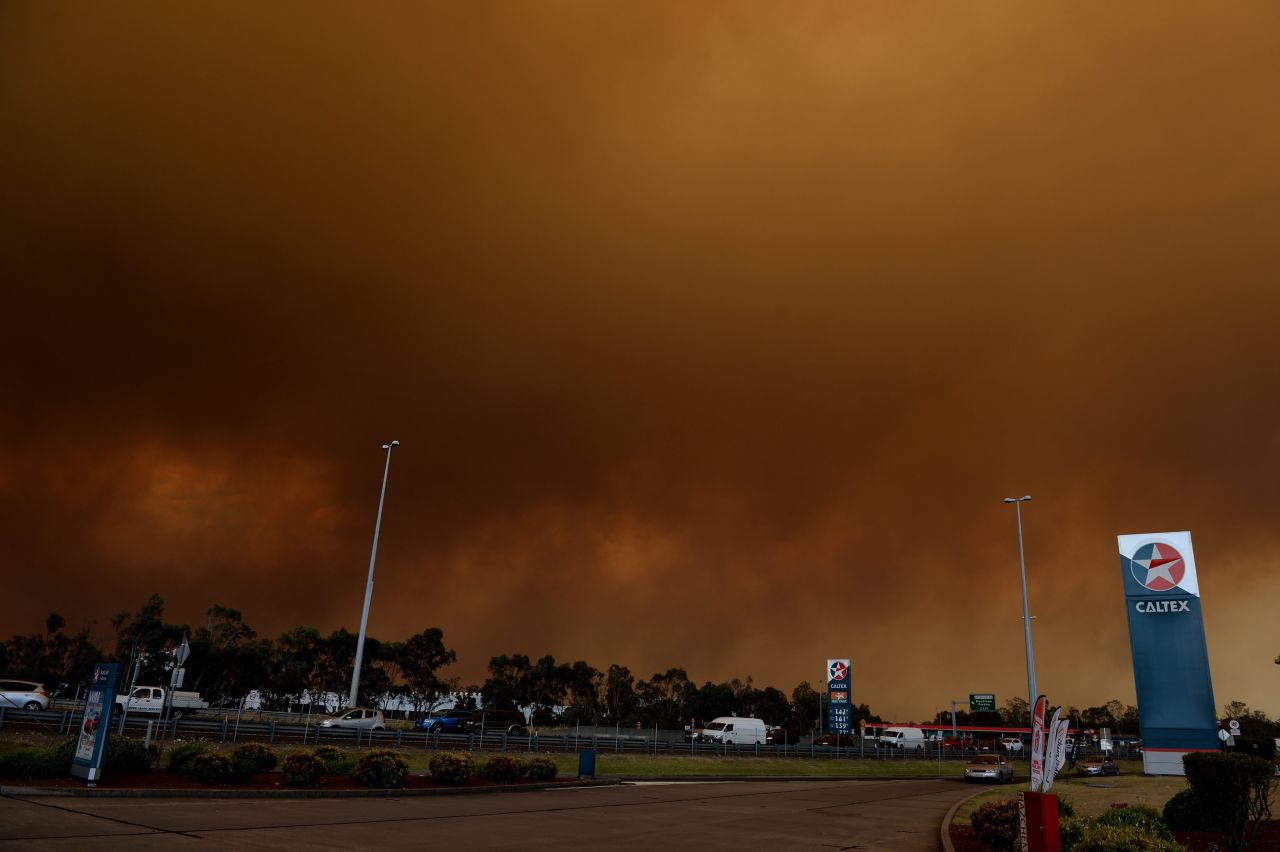 Thick smoke rises from a bush fire burning near Springwood on October 17.