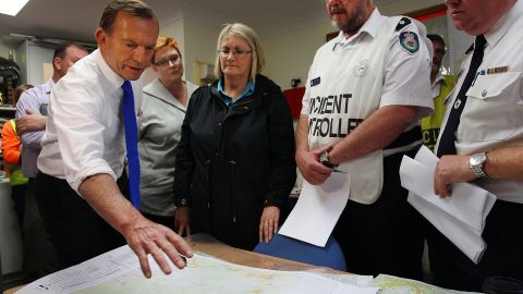 Australian Prime Minister Tony Abbott speaks during a bush fire briefing in Winmalee on October 18.