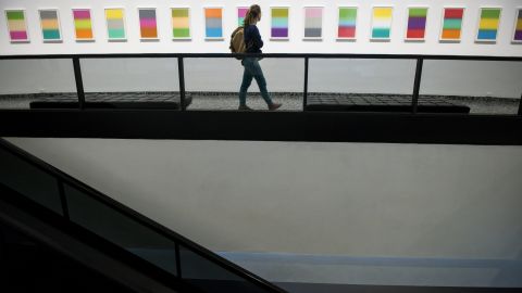 A visitor checks out art in the Hirshhorn Museum and Sculpture Garden in Washington on Thursday, October 17.