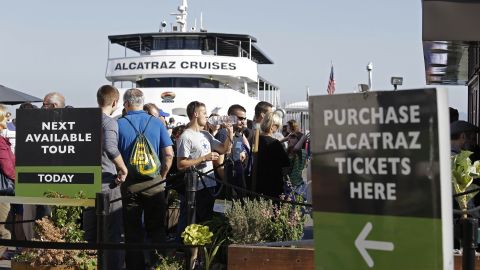 People line up for tickets to visit Alcatraz Island in San Francisco Bay on October 17.