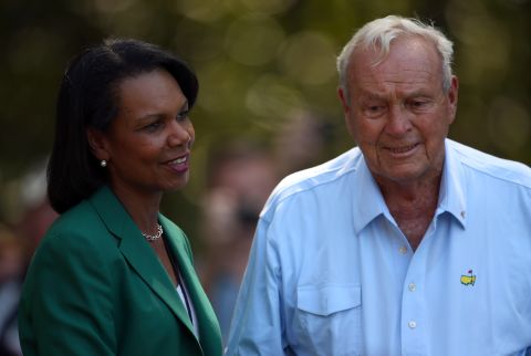 Former U.S. Secretary of State Condoleeza Rice was one of two women finally admitted as members at the previously male-only Augusta National, after a long battle by anti-discrimination campaigners. Here she shares a moment with golf legend Arnold Palmer. 