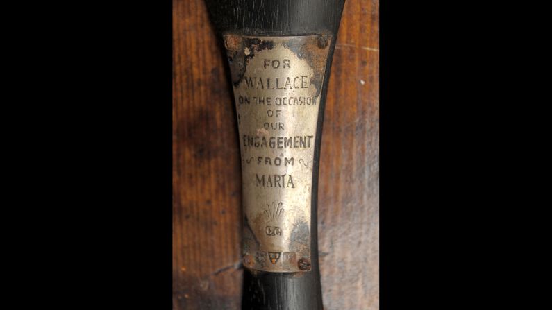 An engraving from Wallace Hartley's fiancee, Maria Robinson, is attached to the Titanic band leader's violin.