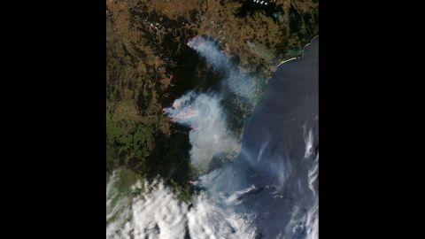 Smoke from the bush fires is seen burning near Sydney in this October 21 photo released by NASA. New South Wales is Australia's most populous state. One in three Australians live there.
