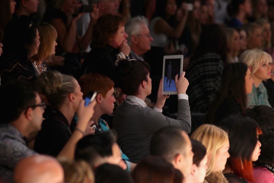 An audience member uses an iPad to photograph a fashion show  on May 1, 2012 in Sydney, Australia. 