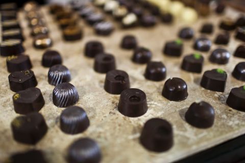Dark chocolate is rich in cocoa solids, which contain compounds known as flavonolds. At high levels, cocoa flavanols have been shown to help lower blood pressure and cholesterol, improve cognition and possibly lower the risk of diabetes. But limit your portions to about 1 ounce a day.
