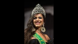 Raika Ferraz smiles after winning the Miss T Brasil 2013 transgender beauty pageant in Rio de Janeiro on October 22, 2013. The Association of Transvestites and Transsexuals in Rio de Janeiro (Astra Rio) organizes the second edition of the beauty pageant, in which 31 contestants under 35 years old compete for the title to then participate in the Miss International Queen 2013 in Pattaya, Thailand on November 1. AFP PHOTO/YASUYOSHI CHIBA        (Photo credit should read YASUYOSHI CHIBA/AFP/Getty Images)