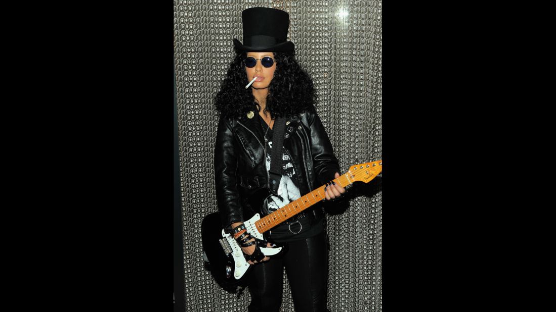Believe it or not, that's Amber Rose under that wig and top hat. The model masqueraded as Slash at Heidi Klum's 2011 Halloween party.