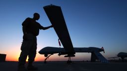 A crew chief from the 46th Expeditionary Reconnaissance Squadron completes a post flight inspections of the RQ-1 Predator after one of its sorties September 15, 2004 in Balad Air Base, Iraq.